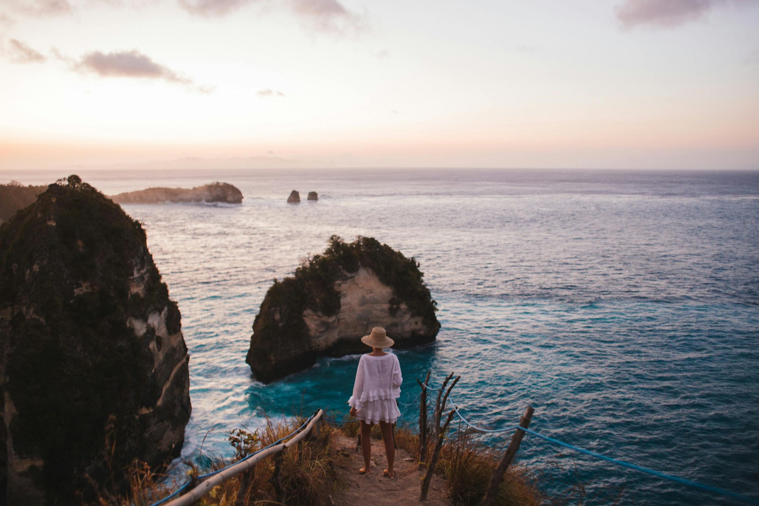 woman standing by ocean